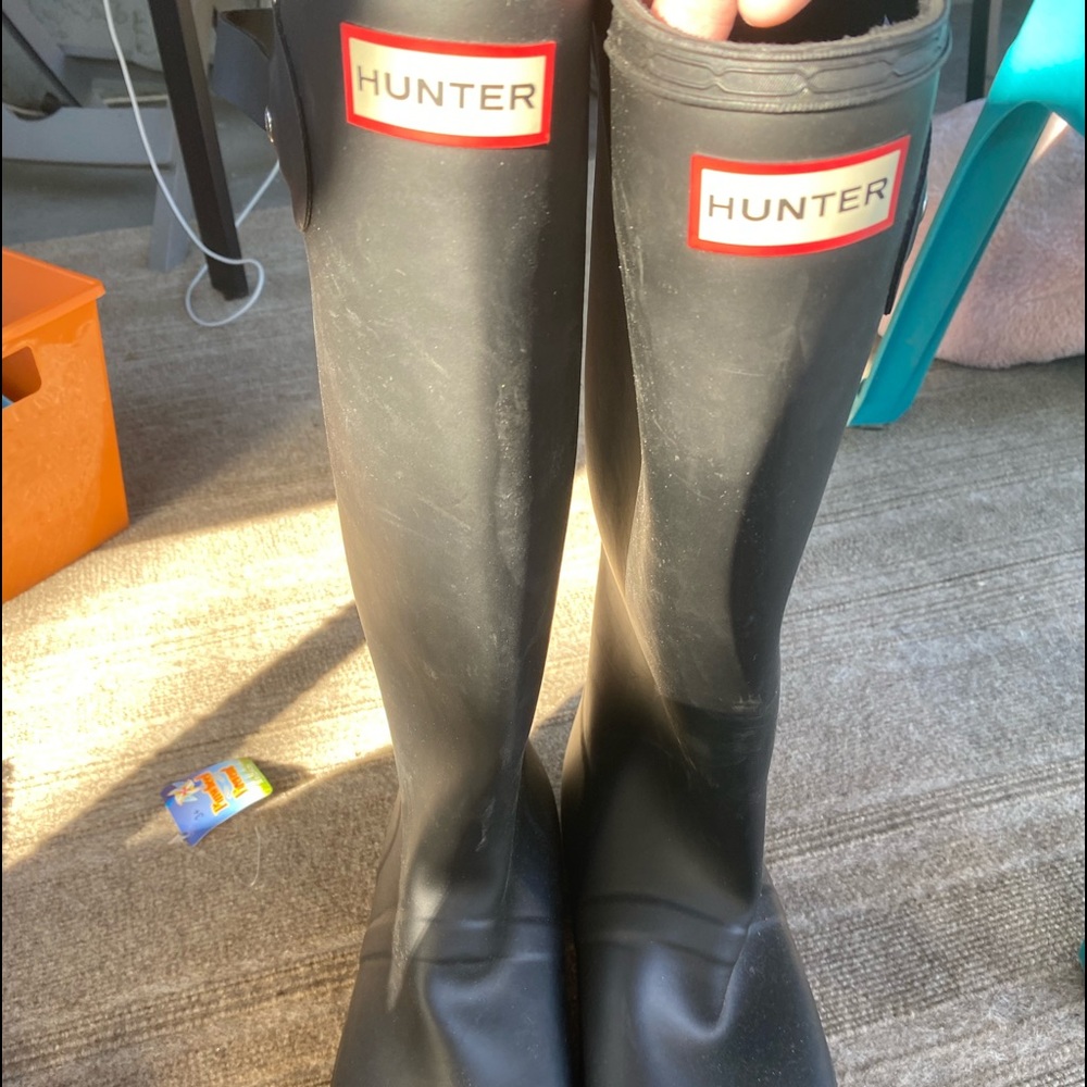 Black tall Hunter rain boots